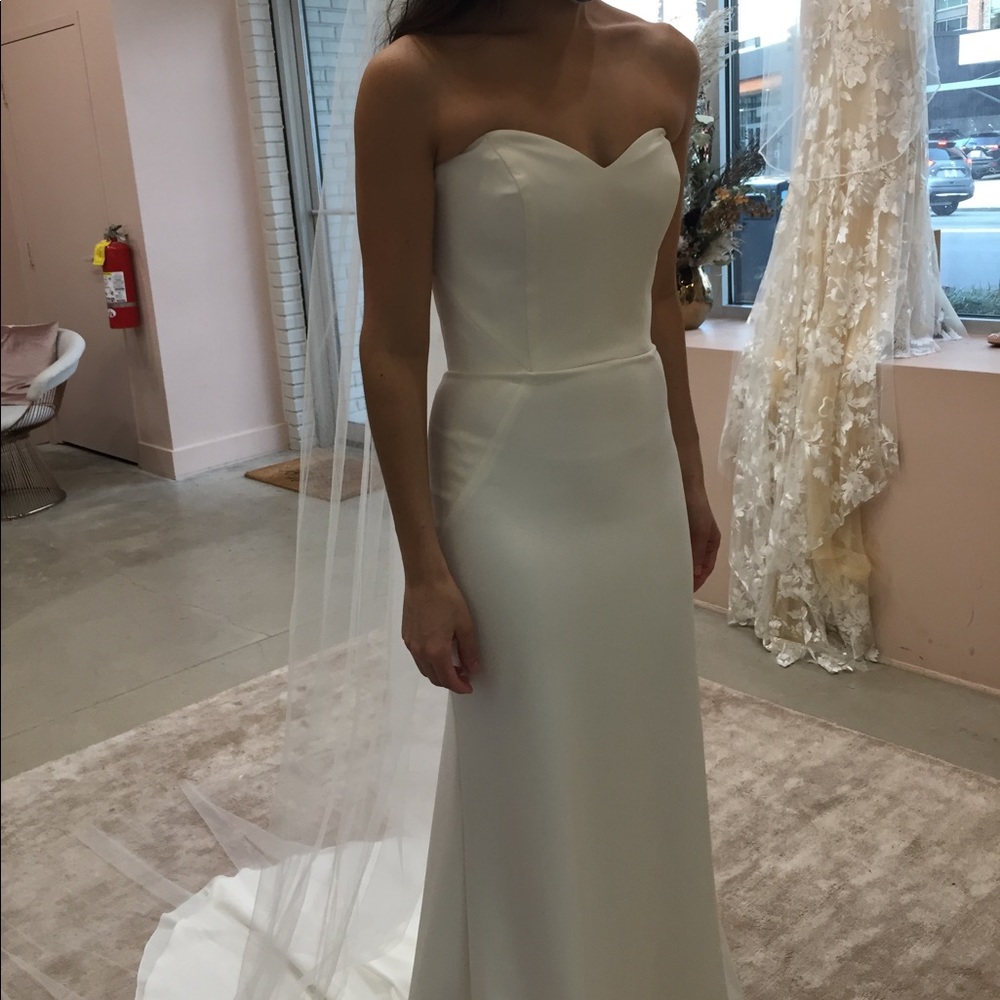 Ivory color, crepe material, dress size 6, I wear size 0